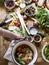 Aerial view of a busy kitchen top with stew ingredients