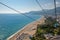 Aerial view from Cableway of beautiful blue Gulf of Antalya and popular seaside resort city Antalya, Turkey