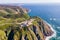 Aerial view of Cabo da Roca lighthouse with majestic coastline looking the Atlantic Ocean, a famous landmark in Colares, Lisbon,