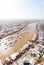 Aerial view of Cai Rang floating market at sunrise, boats selling wholesale fruits and goods on Can Tho River, Mekong Delta region