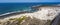 Aerial view of the Caleta del MojÃ³n Blanco, sandy desert beach and rugged coastline. Lanzarote, Spain. Africa