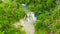 Aerial view of Cambais waterfalls in a mountain gorge in the tropical jungle, Philippines, Cebu. Waterfall in the