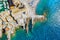 Aerial view of Camogli. Castle della Dragonara near the ligurian sea beach. View from above on rock and sea with transparent