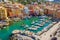 Aerial view of Camogli. Colorful buildings near the ligurian sea beach. View from above on boats and yachts moored in marina with