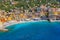 Aerial view of Camogli. Colorful buildings near the ligurian sea. View from above on the public beach with azure and clean water