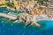 Aerial view of Camogli. Colorful buildings near the ligurian sea. View from above on the public beach with azure and clean water