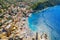 Aerial view of Camogli. Colorful buildings near the ligurian sea. View from above on the public beach with azure and clean water