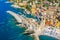 Aerial view of Camogli. Panorama of Castle della Dragonara and Basilica Santa Maria Assunta. Colorful buildings near the ligurian