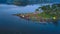 Aerial view, camp on the edge of a Sermo reservoir