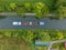 Aerial view of a canal with a cargo boat in Belgium. Canals with water for transport, agriculture. Fields and meadows