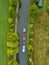 Aerial view of a canal with a cargo boat in Belgium. Canals with water for transport, agriculture. Fields and meadows