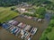 Aerial view of a canal marina basin with moorings for narrow boats and barges