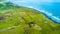 Aerial view on the Cape Egmont lighthouse on the coast of Tasman sea. Taranaki region, New Zealand