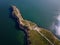 aerial view of Cape Kaliakra, Bulgaria's enchanting headland. Marvel at the majestic cliffs, ancient fortress, and