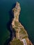 aerial view of Cape Kaliakra, Bulgaria's enchanting headland. Marvel at the majestic cliffs, ancient fortress, and