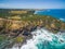 Aerial view of Cape Schanck Lighthouse and rugged cliffs, Australia.