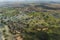 An aerial view capturing the swirling patterns of lush vegetation, water and land in the Okavango Delta, Botswana