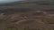 Aerial view car parked in desolate countryside off road in Iceland. Drone view of icelandic highlands with four by four