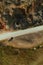 Aerial view of car parked at the side of the road through mountainside landscape