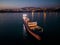 Aerial view cargo bulk carrier ship on the sea at night