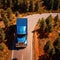 Aerial view of cargo truck on the open road, land transport logistics