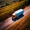 Aerial view of cargo truck on the open road, land transport logistics