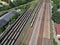 Aerial view on cargo wagons on train station in city