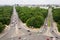 Aerial view of cars passing crossroad under Victory Column in Tiergarten in Berlin, Germany