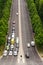 Aerial view of cars passing crossroad under Victory Column in Tiergarten in Berlin, Germany