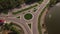 Aerial view of cars at a roundabout.