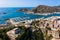 Aerial view of Cartagena port city with buildings and coast line, Murcia