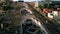 Aerial view of the Cascade Monument, evening sun rays, people walking along the