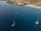 Aerial view of a catamaran and boats close the shores of Lanzarote, Spain