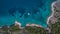 Aerial view of Catamaran and yacht in the sea near Greek island