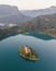 Aerial view of Cerkev Marijinega, a Catholic Church on a small island in the middle of Bled Lake at sunrise, Upper Carniola,