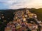 Aerial view Cervo medieval town on the mediterranean coast, Liguria riviera, Italy, with the beautiful baroque church and tower be