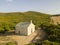 Aerial view of the chapel of Santa Maria. Cap Corse Peninsula, Corsica. Coastline. France