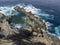 Aerial view on Charco del Viento natural pool in black lava rocks on Tenerife, Canary islands, Spain