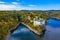 Aerial view chateau Orlik, above Orlik reservoir in beautiful autumn nature. Romantic royal Schwarzenberg castle above water level