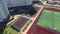 Aerial view childrens playing on sport ground in courtyard residential area