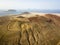 Aerial view of Chinijo Archipelago of La Graciosa, Lanzarote, Canary Islands. Spain. La Aguja Grande mountain