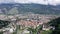 Aerial view of Chur townscape overlooking reformed church of St. Martin and Catholic Cathedral on summer day, canton of