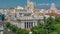 Aerial view of Cibeles fountain at Plaza de Cibeles in Madrid timelapse in a beautiful summer day, Spain