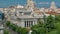 Aerial view of Cibeles fountain at Plaza de Cibeles in Madrid timelapse in a beautiful summer day, Spain