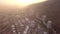 Aerial view, city and buildings, mountain and neighborhood outdoor, urban development and property in Cape Town. Drone