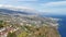 Aerial view of the city of Funchal and Camara de Lobos, tourist and iconic city on the island of Madeira, in Portugal