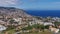 Aerial view of the city of Funchal and Camara de Lobos, tourist and iconic city on the island of Madeira, in Portugal