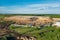 Aerial view of city garbage dump. Pile of plastic trash, food waste, landfill. Pollution concept