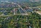 Aerial view on city housing area with many buildings, roads and garden