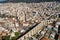 Aerial view the city of Kavala in northern Greek, ancient aqueduct Kamares, homes and medieval city wall